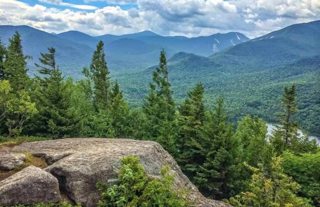 The view from the top of a mountain overlooking a lake near Upstate Independence.